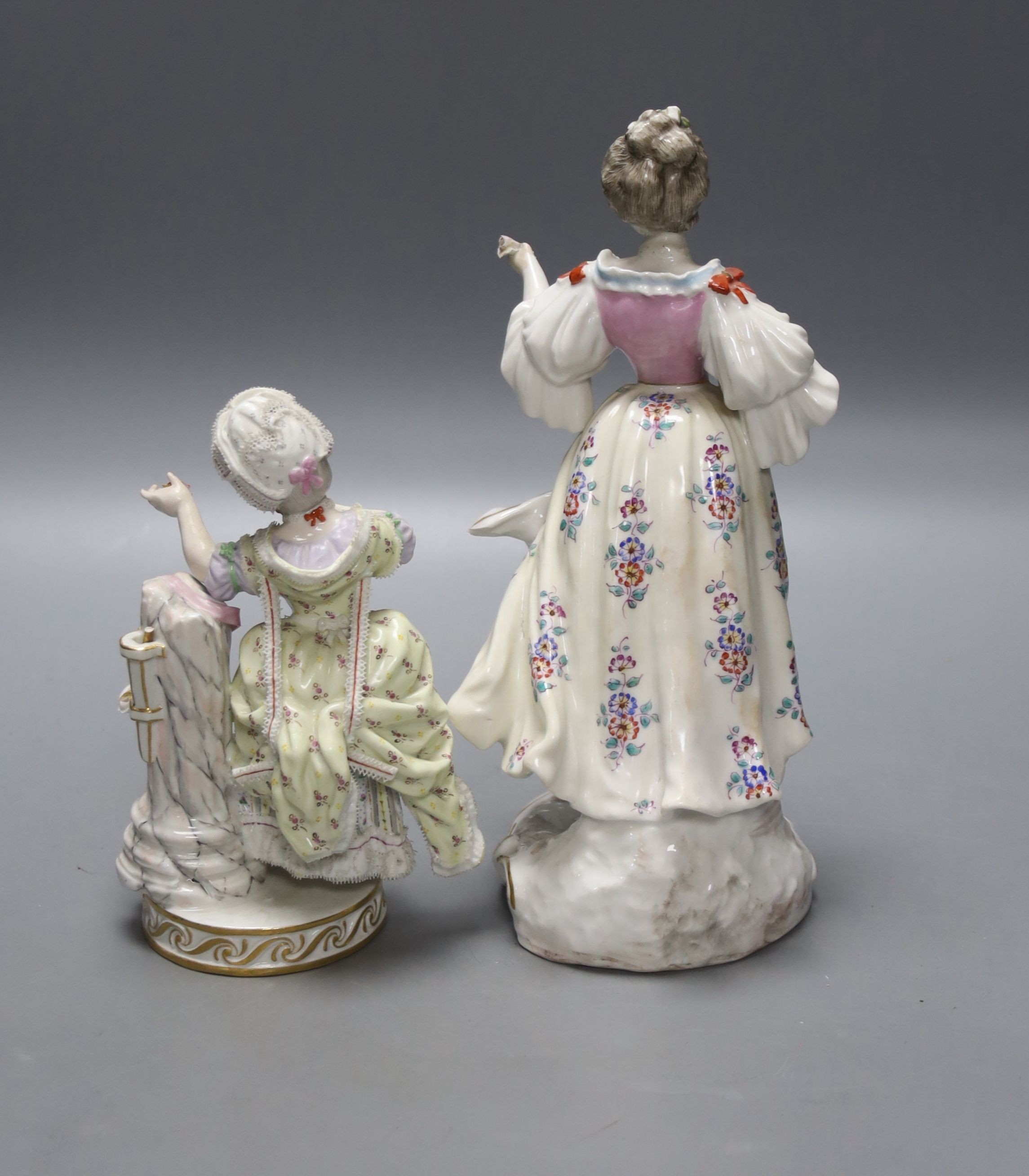 A Meissen figurine, and a continental porcelain figure of a lady with pseudo Derby Mark, tallest 22.5cm